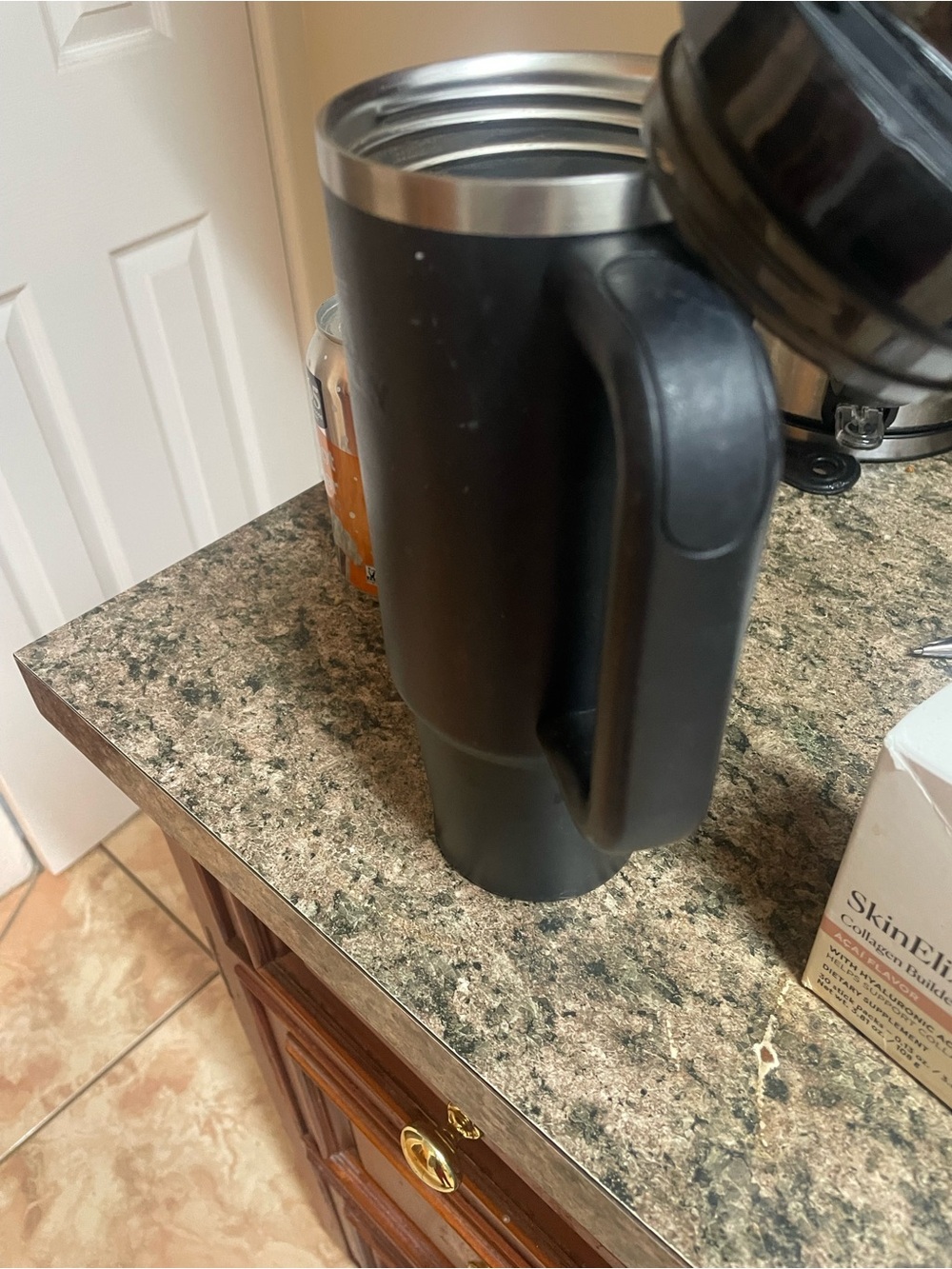 Stanley Black Travel Mug with Silver Trim and Handle - Picture 3 of 4